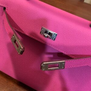 Brand new Absolutely stunning fuchsia real leather trendy purse size 25 w/ strap